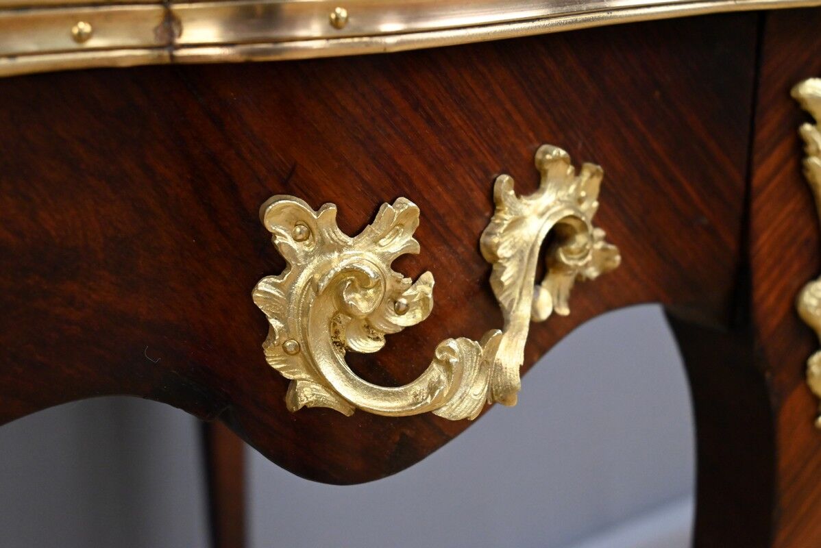 Rosewood, mahogany, and rosewood desk-table, Louis XV style – early 20th century.