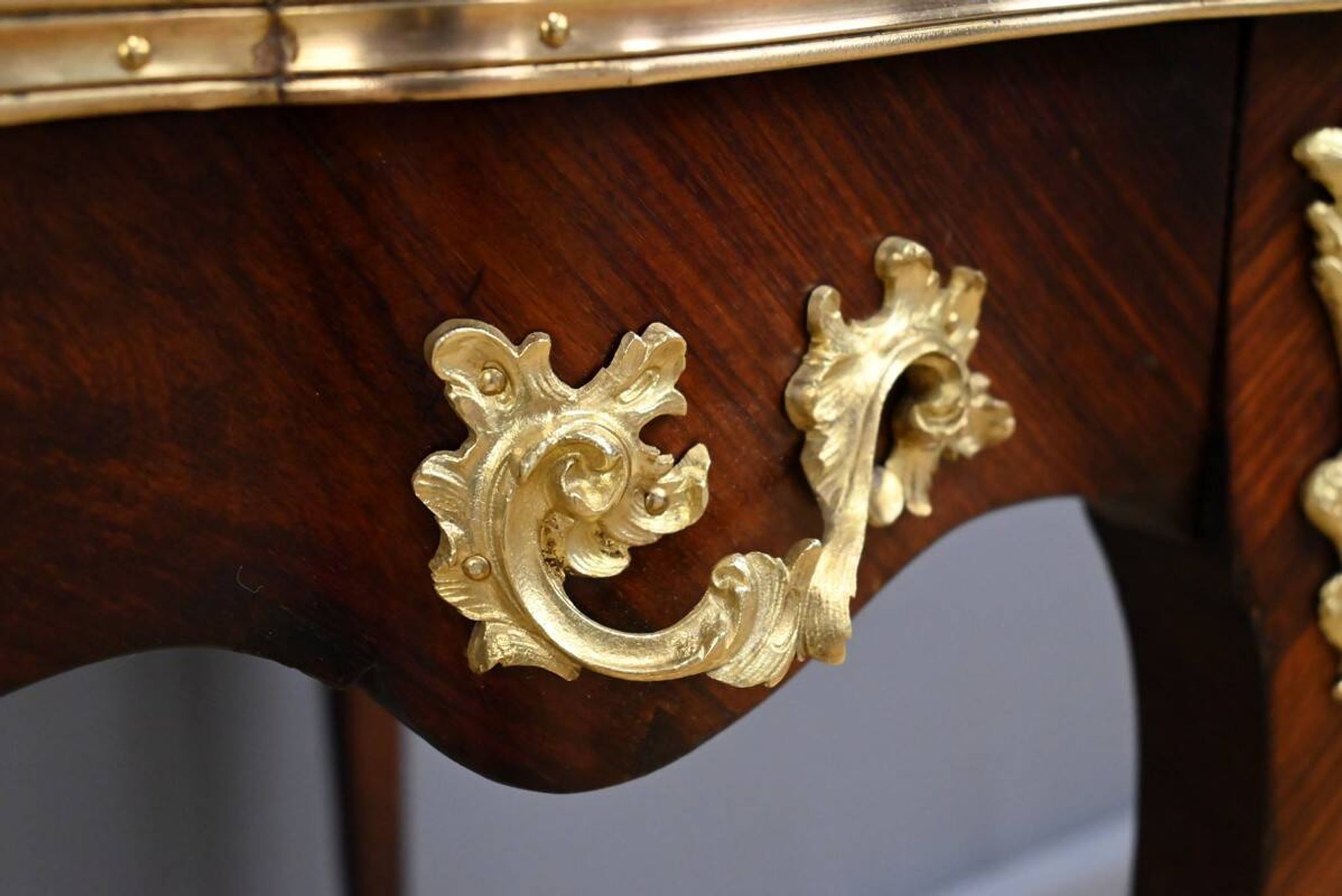 Rosewood, mahogany, and rosewood desk-table, Louis XV style – early 20th century.