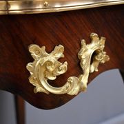 Rosewood, mahogany, and rosewood desk-table, Louis XV style – early 20th century.