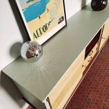 Wooden sideboard in soft green
