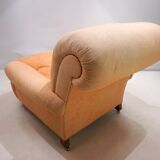 Deep seated armchair in the style of Howard & Sons