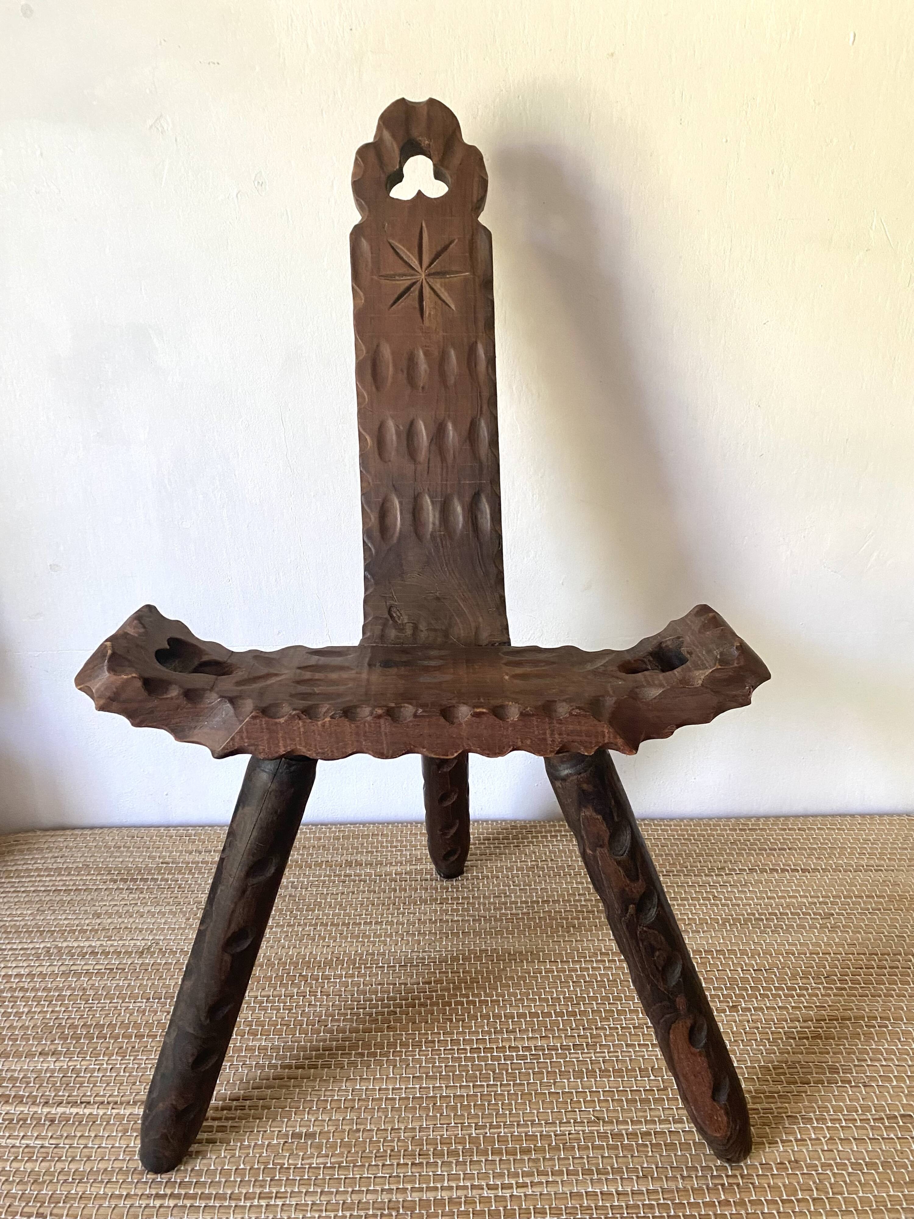 Vintage Spanish tripod chair in carved wood