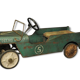 Green metal pedal car