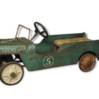 Green metal pedal car