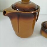 Coffee pot and sugar bowl in glazed stoneware, deep brown glazes.