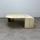 Table basse travertin forme œil par Roche Bobois