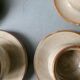 5 glazed stoneware shells, signed