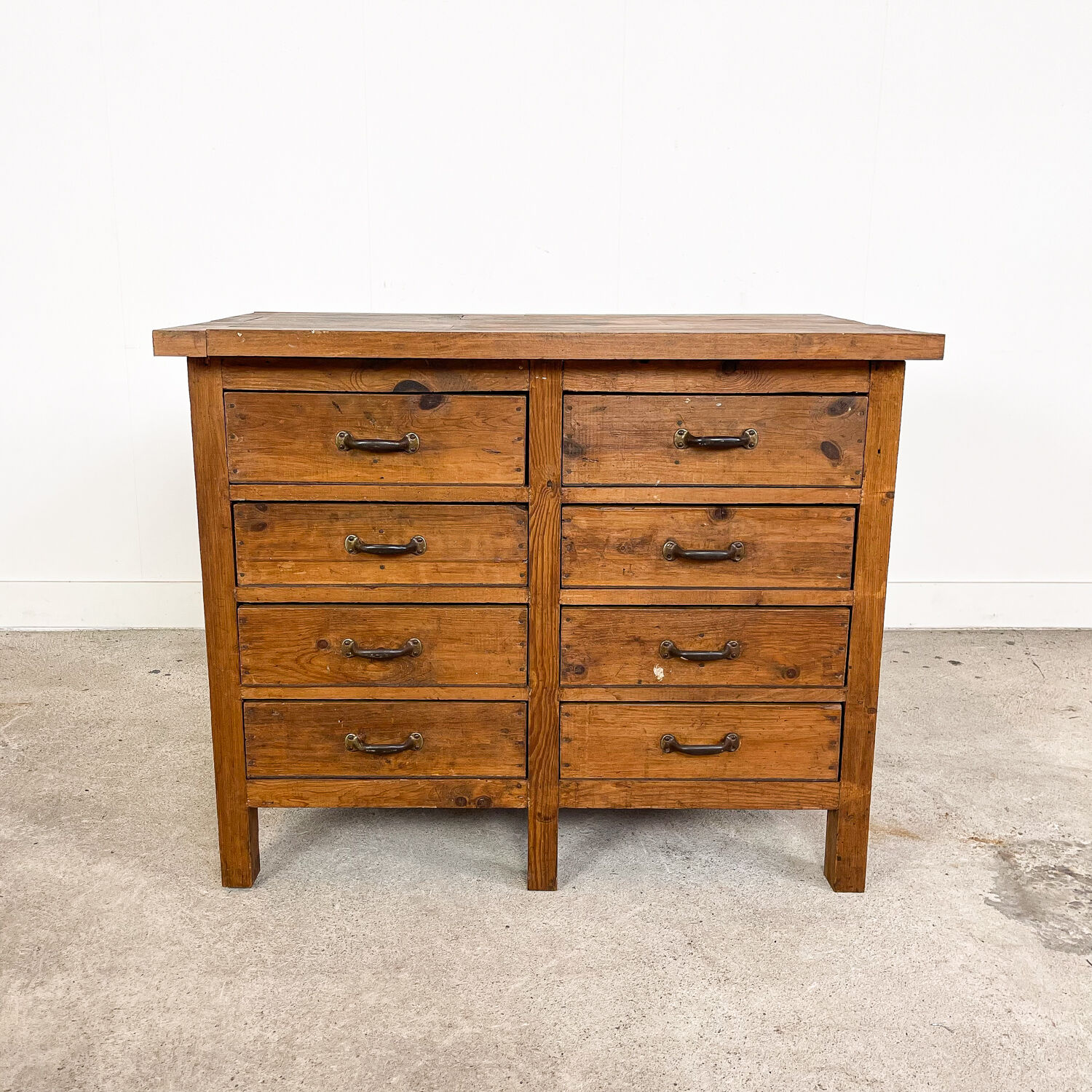 Vintage industrial wooden workbench with drawers
