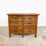 Vintage industrial wooden workbench with drawers