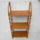 Rattan wall shelf