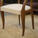 Pair of bridge armchairs in walnut and cream boucle fabric, early 20th century.