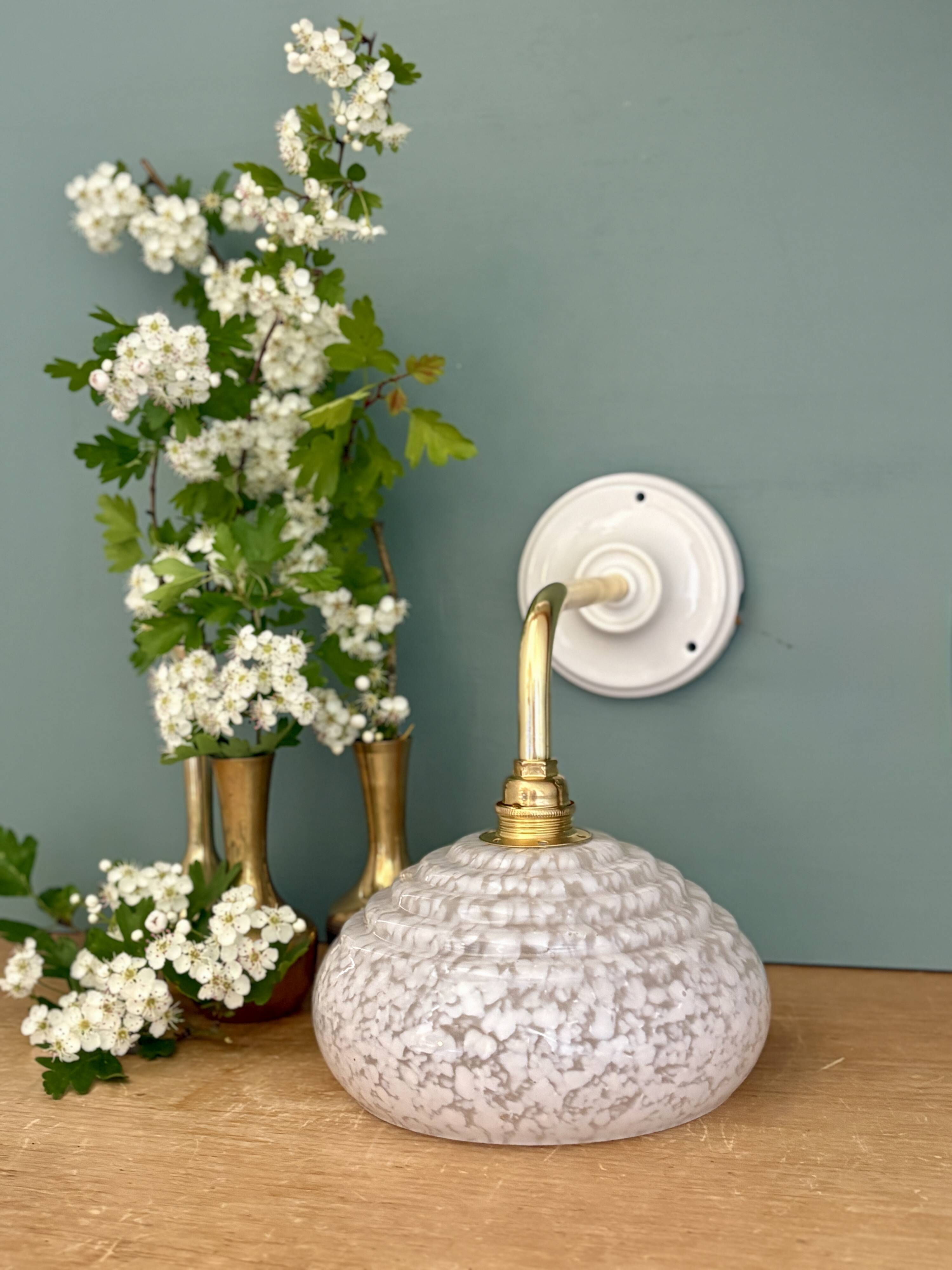 Vintage glass wall lamp with a white Clichy shade.