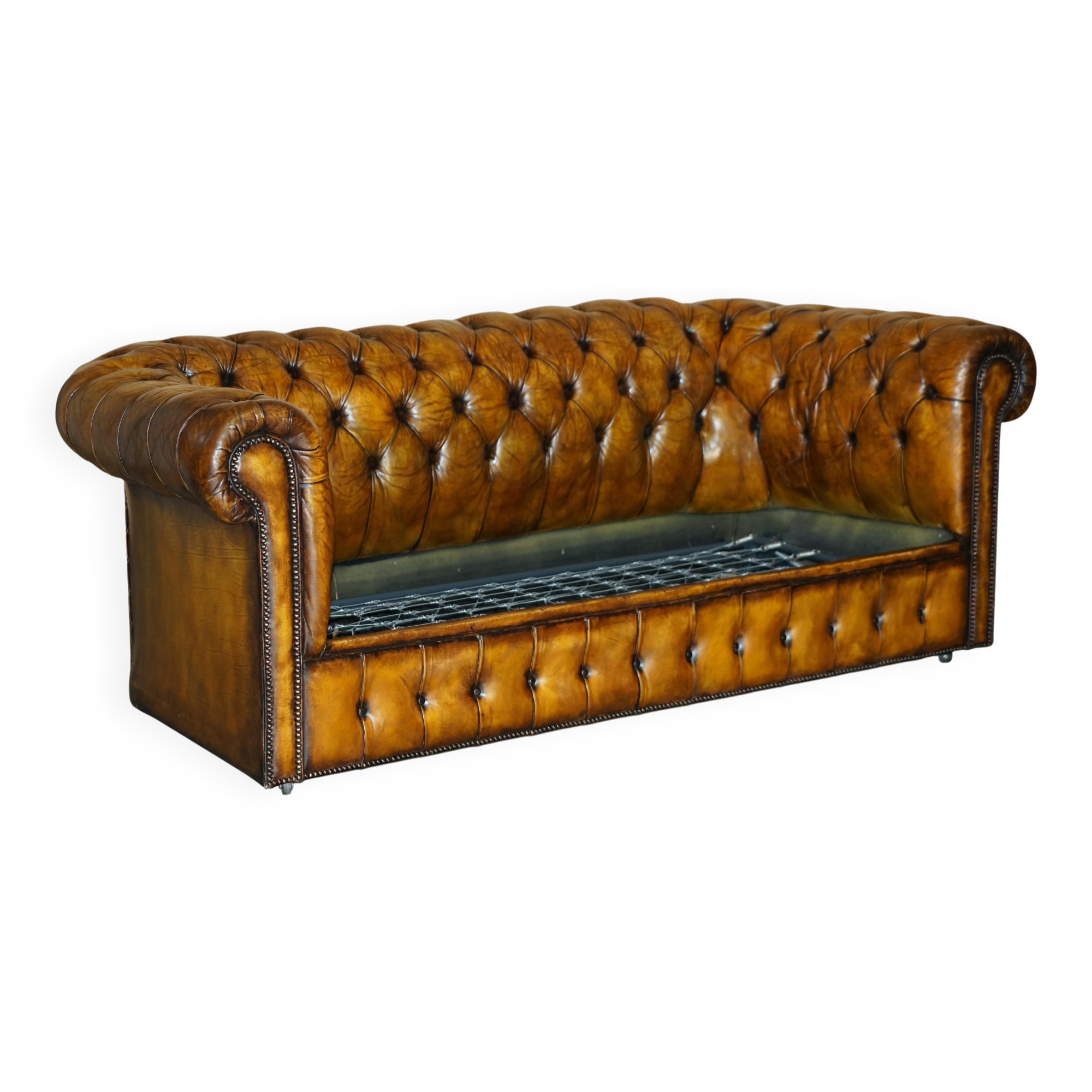 Vintage Chesterfield leather sofa bed, fully restored, circa 1940.