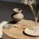 Petrified wood catchall or dish in beige with several grey spots in the centre.