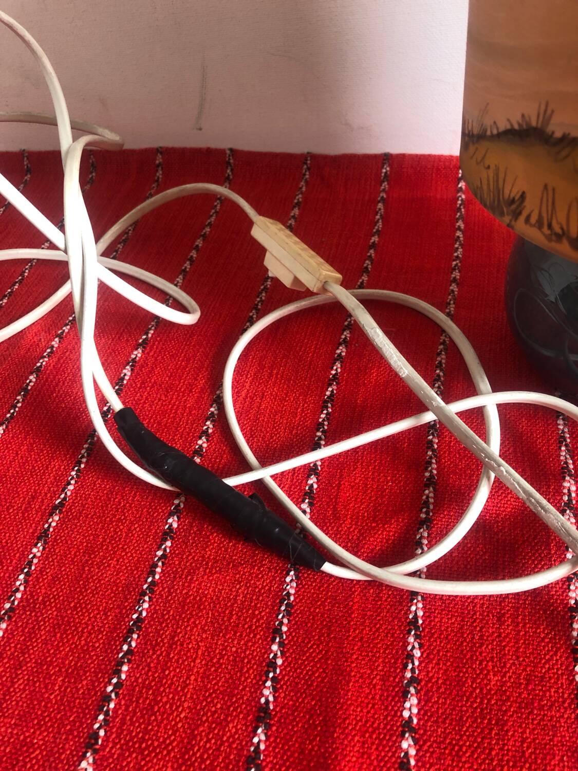 Old ceramic lamp with a silk shade signed Misslen.