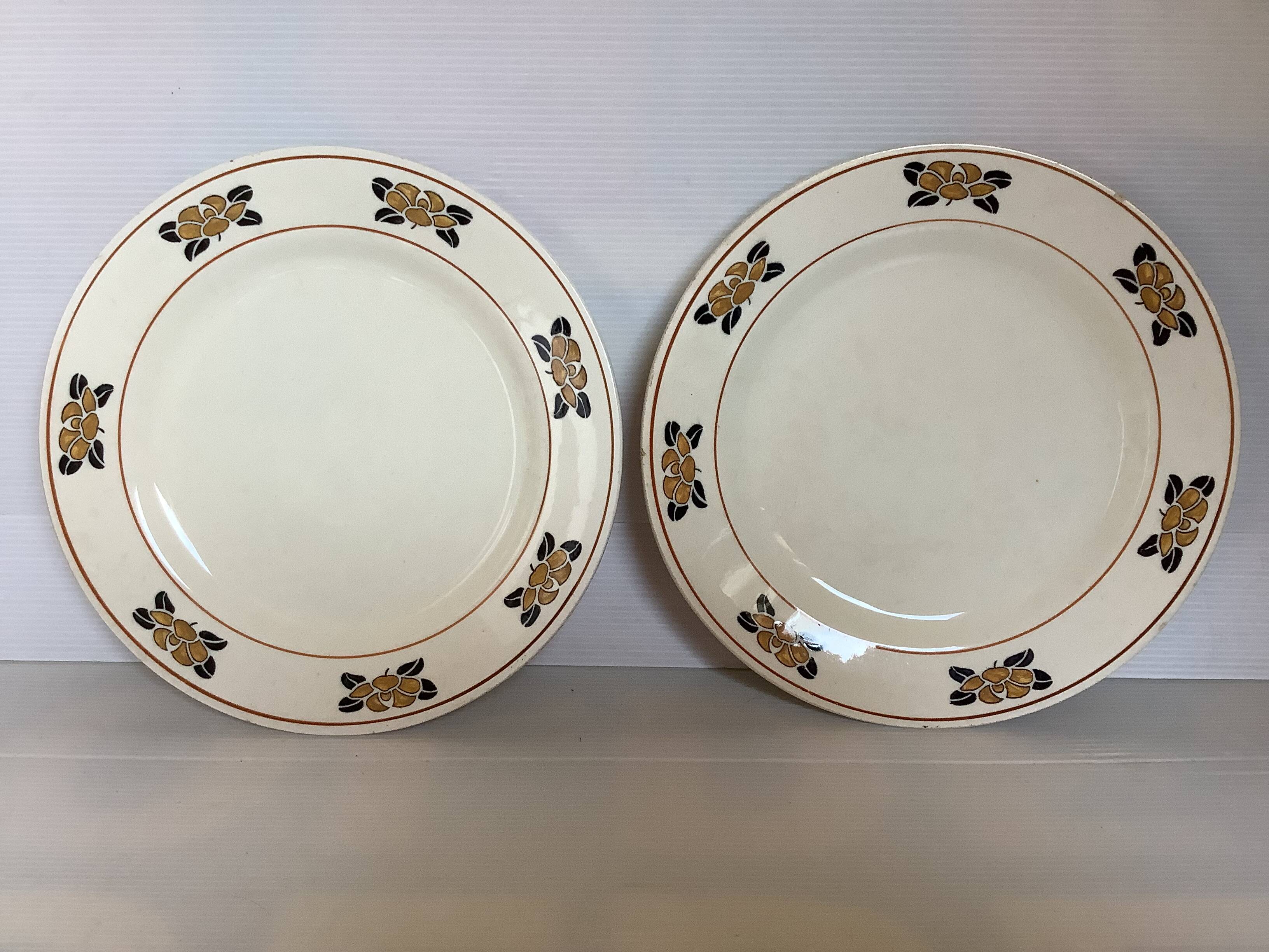 Pair of old iron earth water lily plates