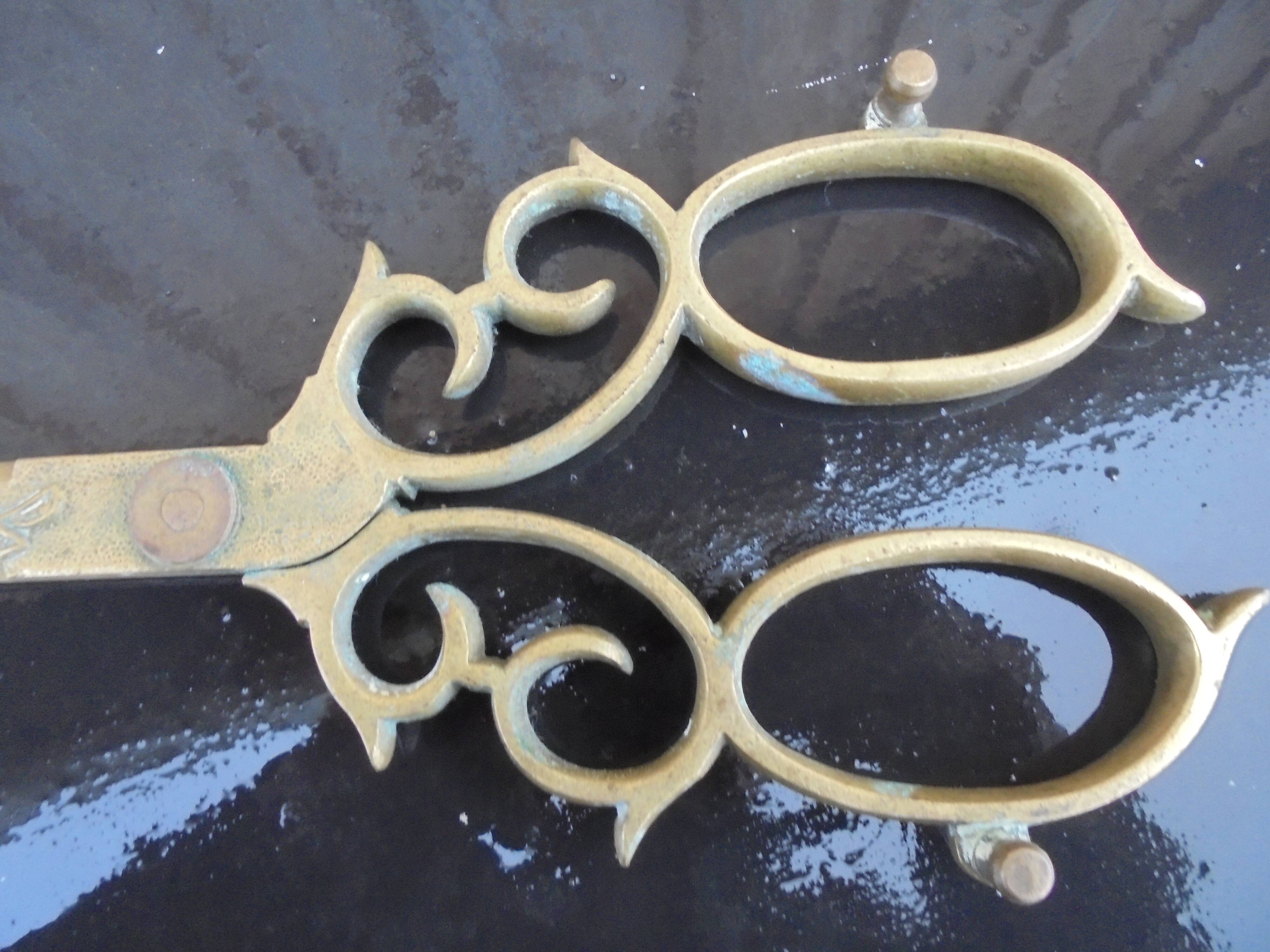 Zoomorphic bronze fireplace shovel and tongs