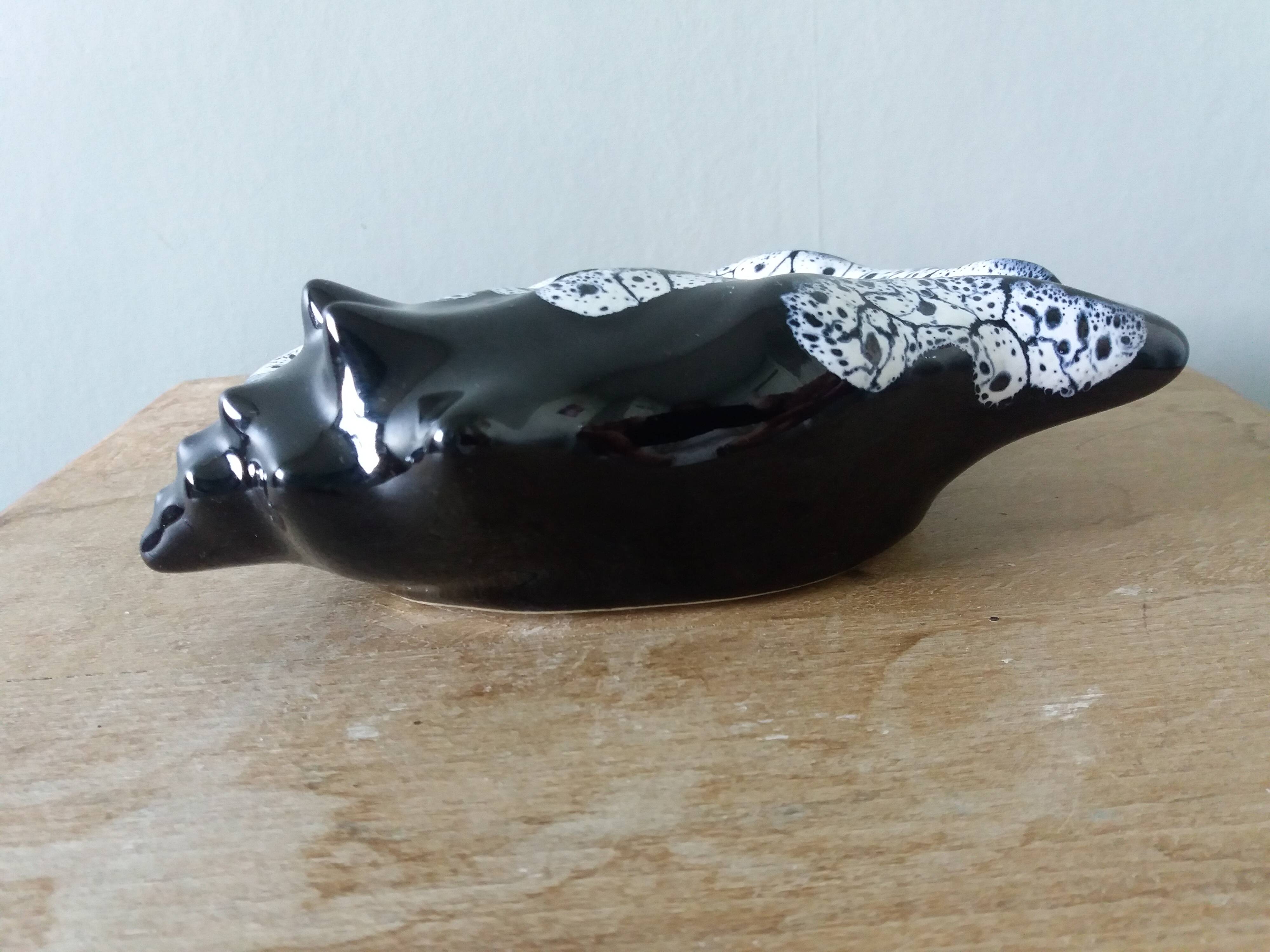 Black ceramic and foam shell ashtray