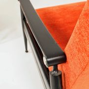 Pair of vintage armchairs in burnt orange, MCM design from the 1960s.