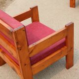 Pair of pine fireside chairs, France, 1960s, "raspberry" cushions