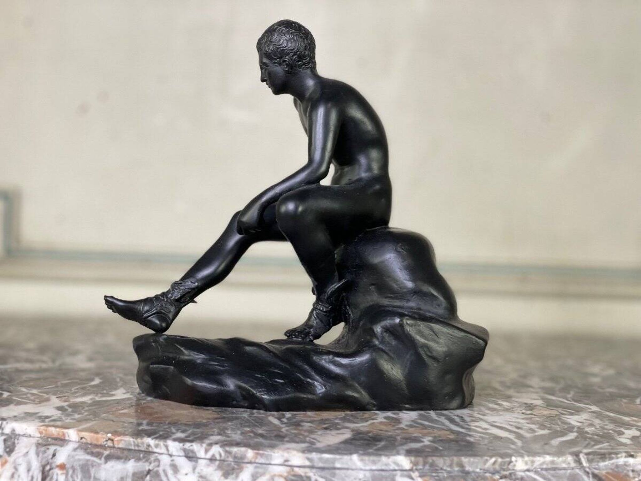Hermès at rest, black patinated bronze after the antique.