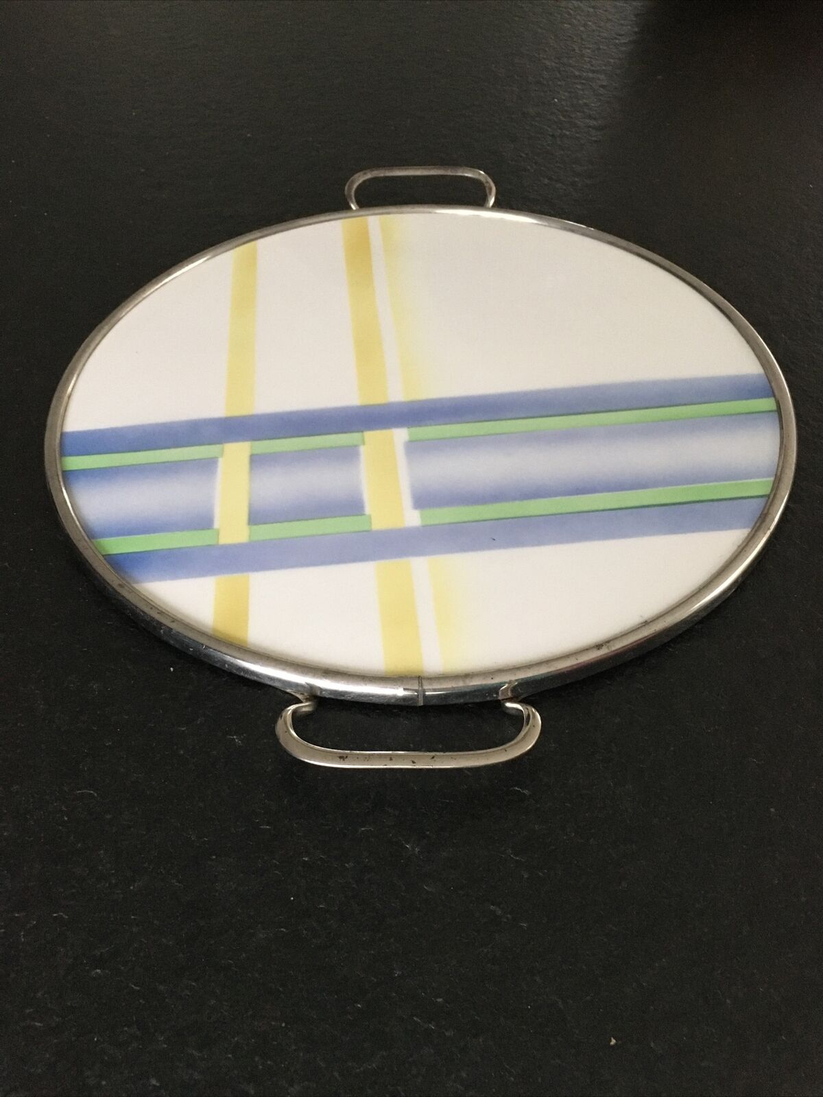 Vintage round tray with 1970s handles