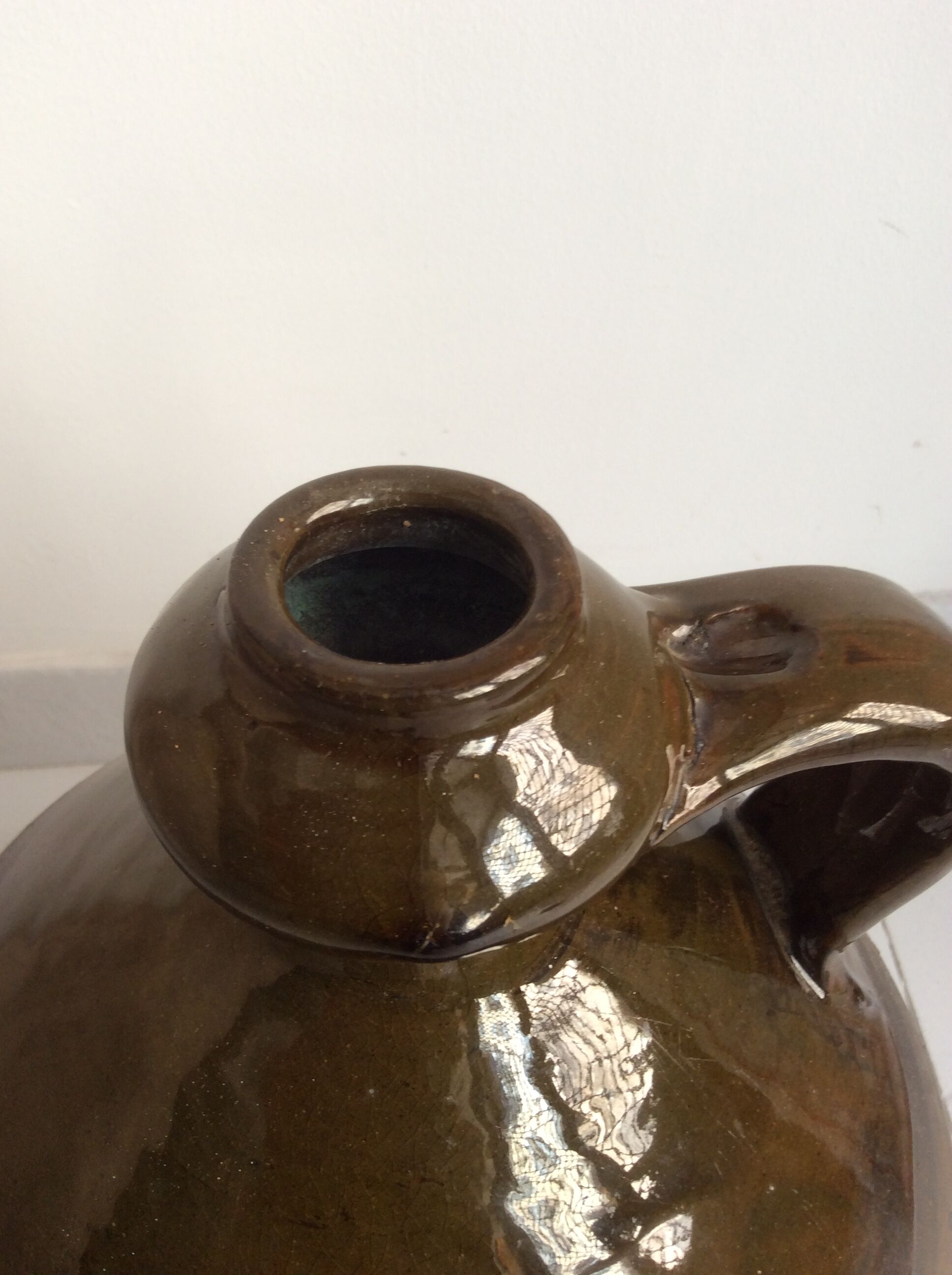 Old terracotta jug glazed Provençal