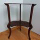 Triplet console harness in carved wood