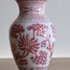 Chinese style flower vase with red and white flowers