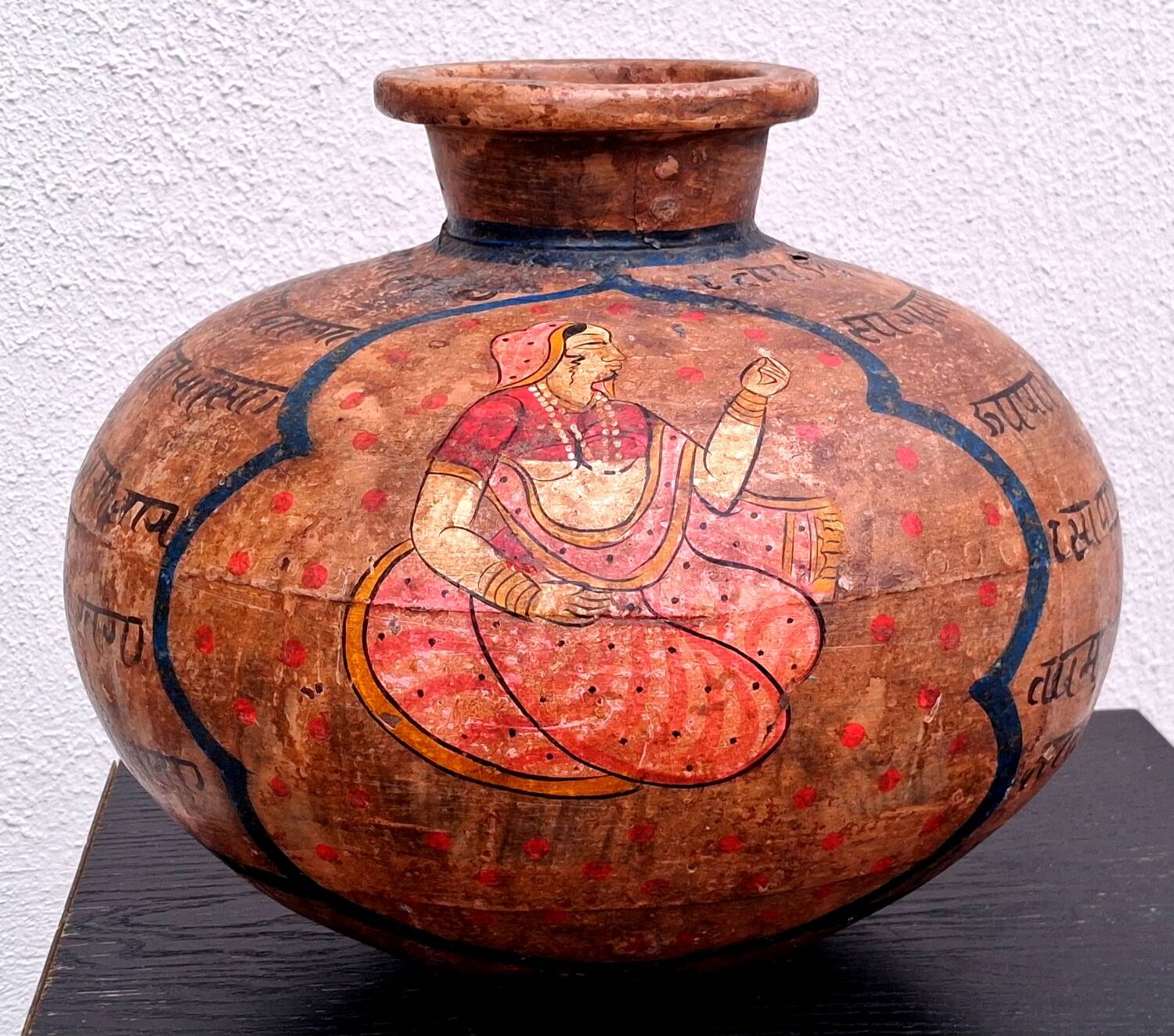 Terracotta vase, decoration of Persian figures.