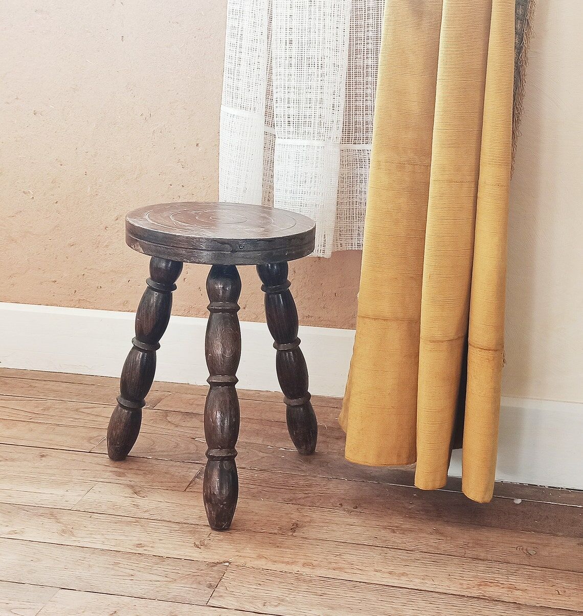 Wooden tripod stool