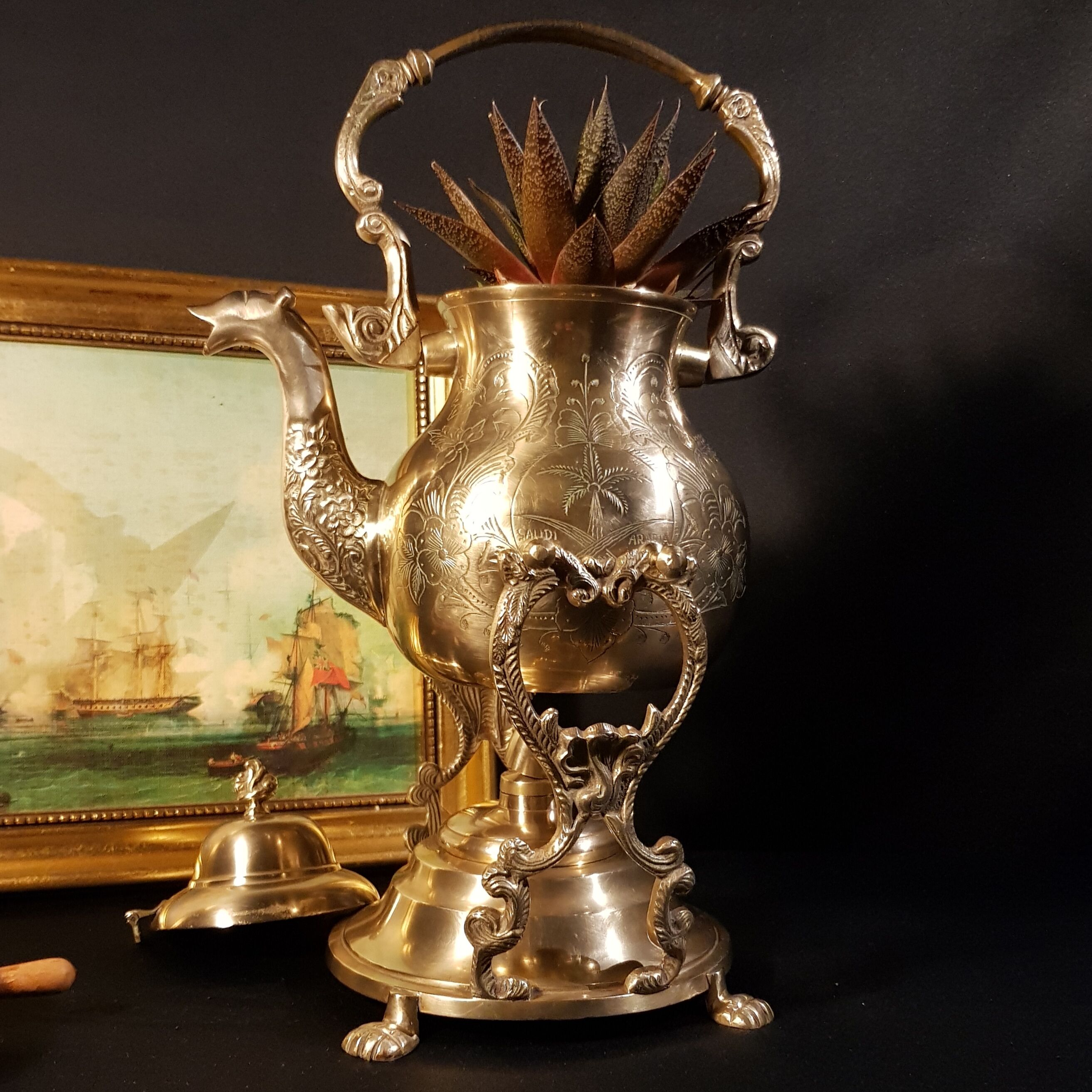 Oriental teapot on its support