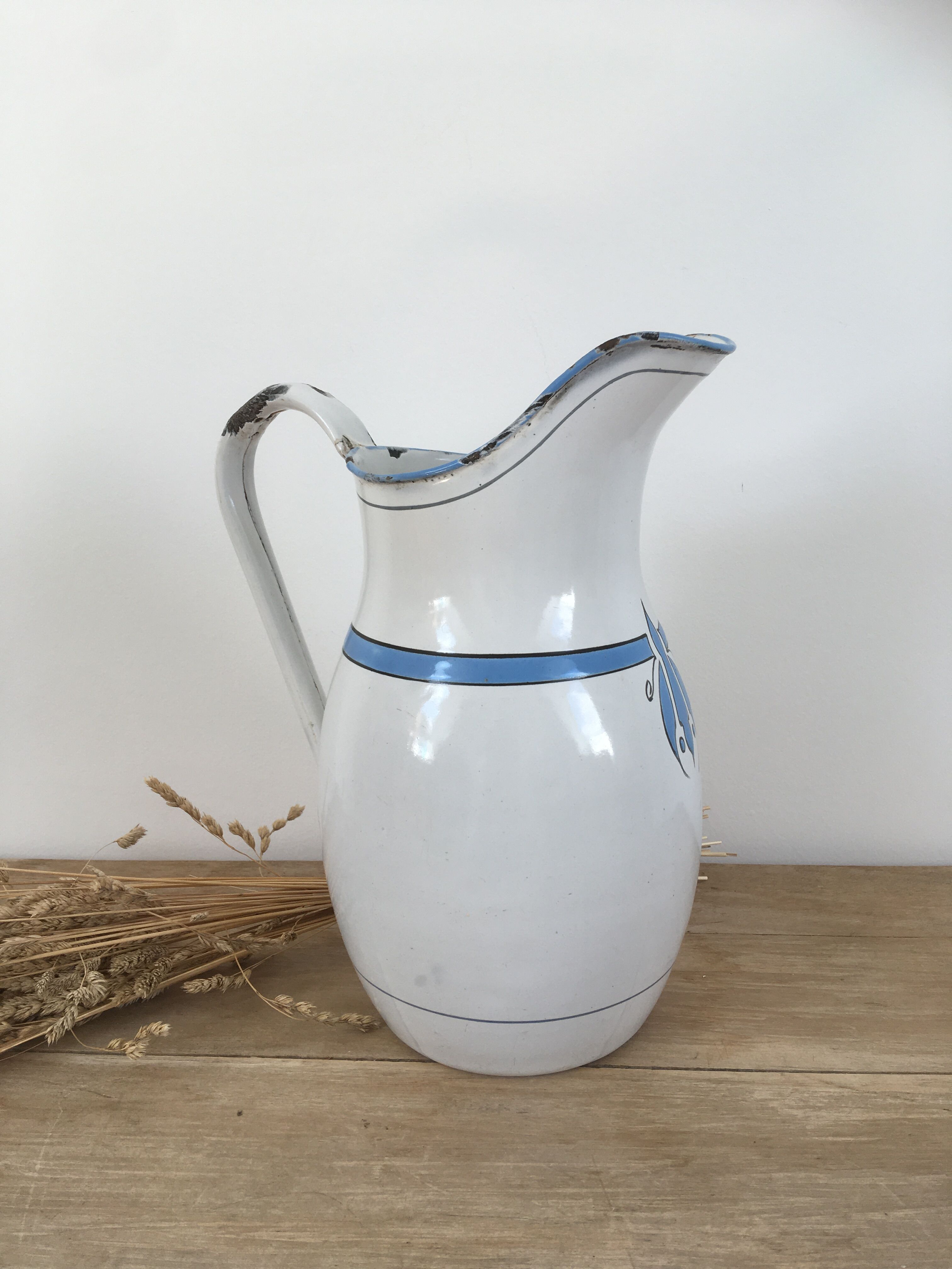White enamelled sheet metal pitcher blue pattern
