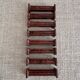 Set of 8 Bakelite knife rests with mahogany effect Art Deco