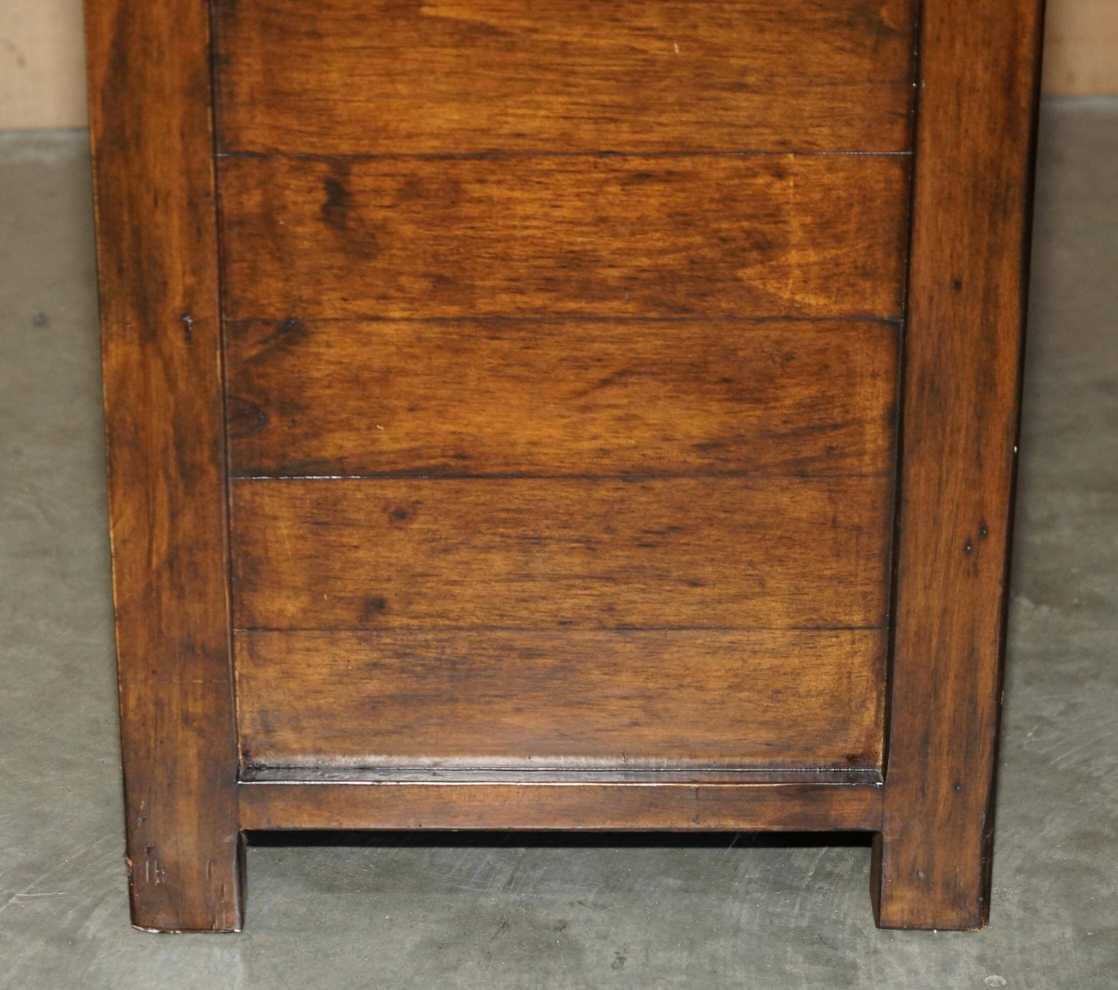 Large vintage hardwood furniture in military country style.