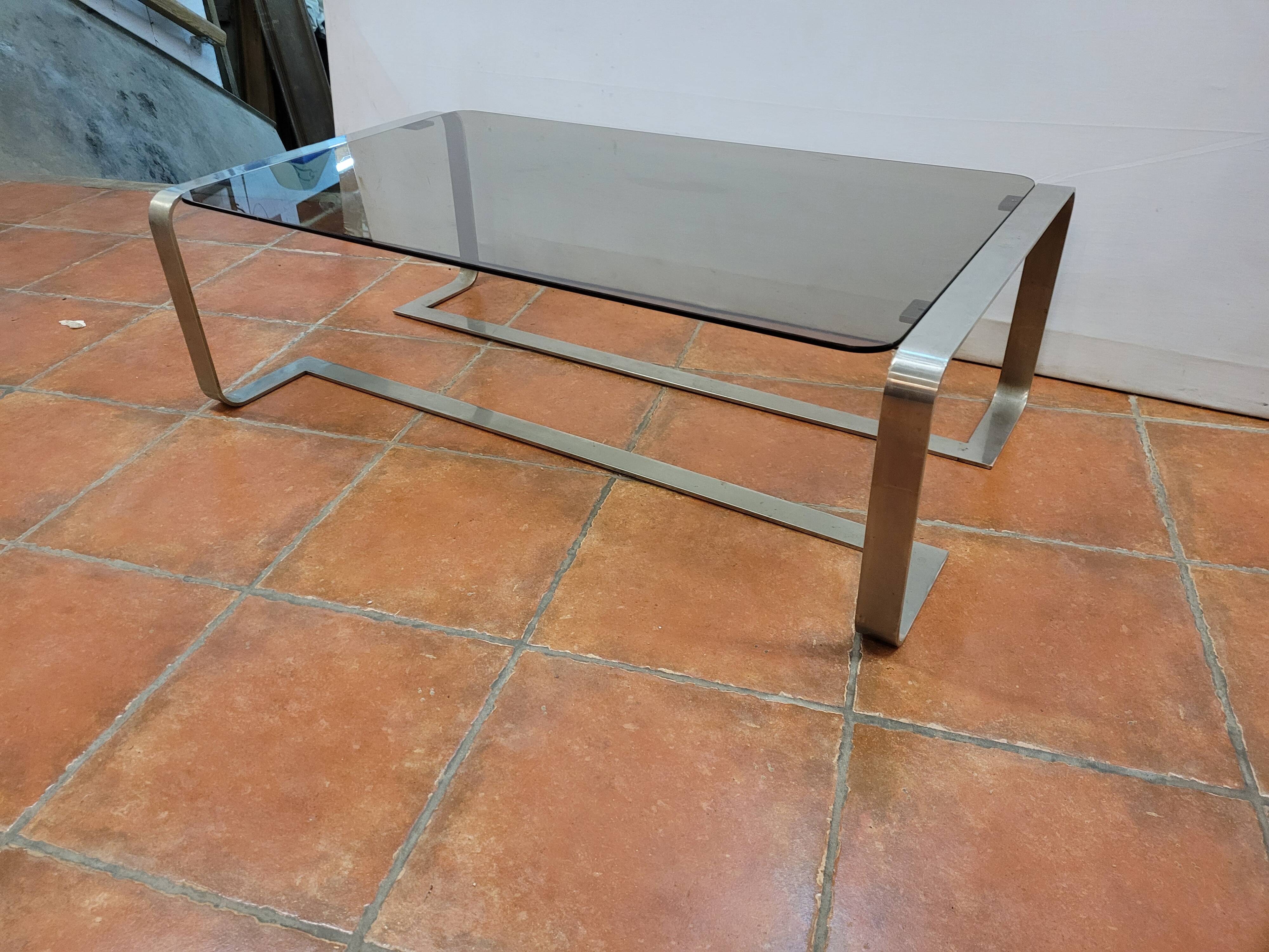 Coffee table with stainless steel base and smoked glass, from the 70s