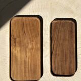 Trio of rounded rectangular trays or cups in monoxyl teak L:35