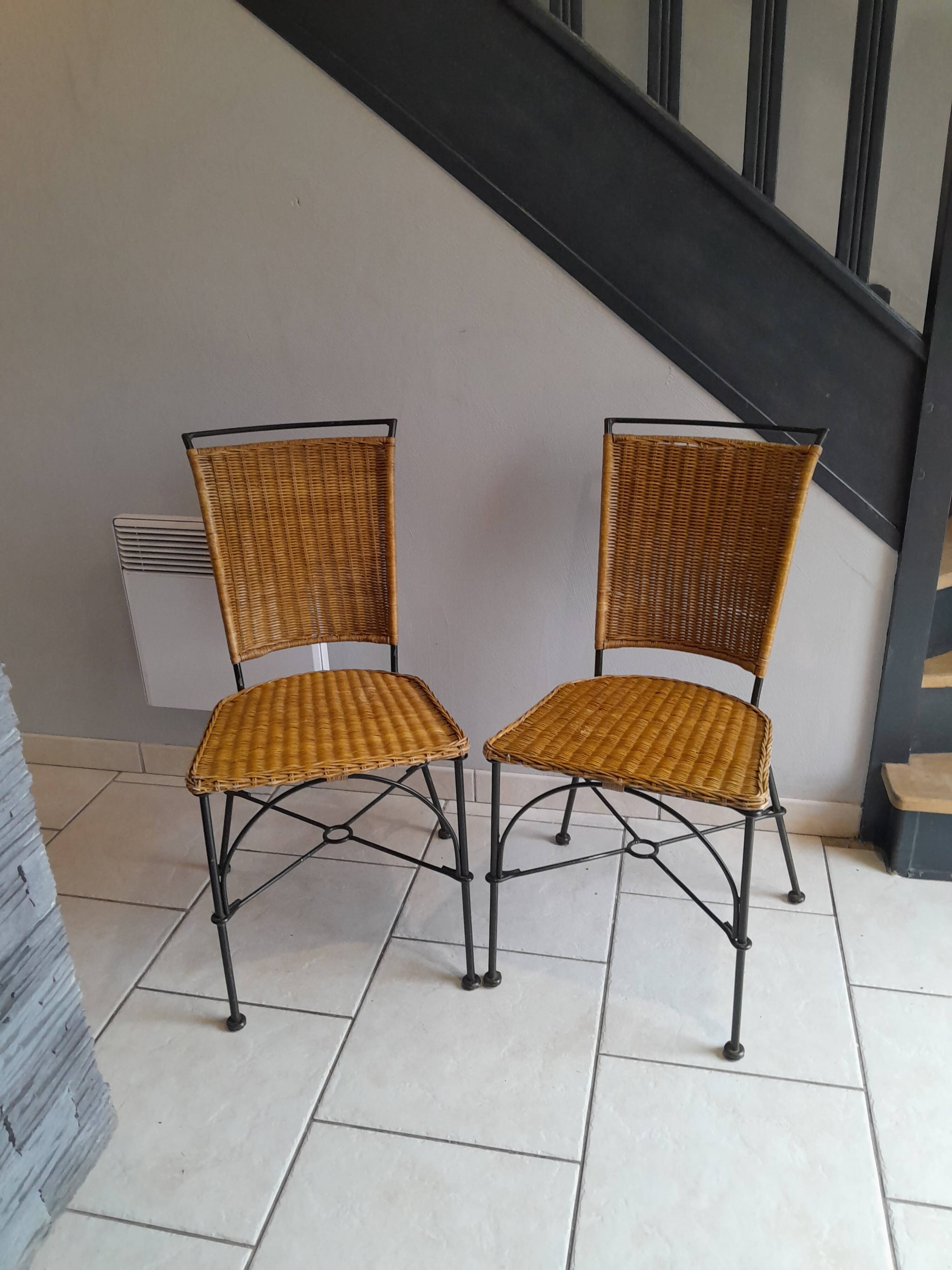 Pair of vintage wrought iron and rattan chairs
