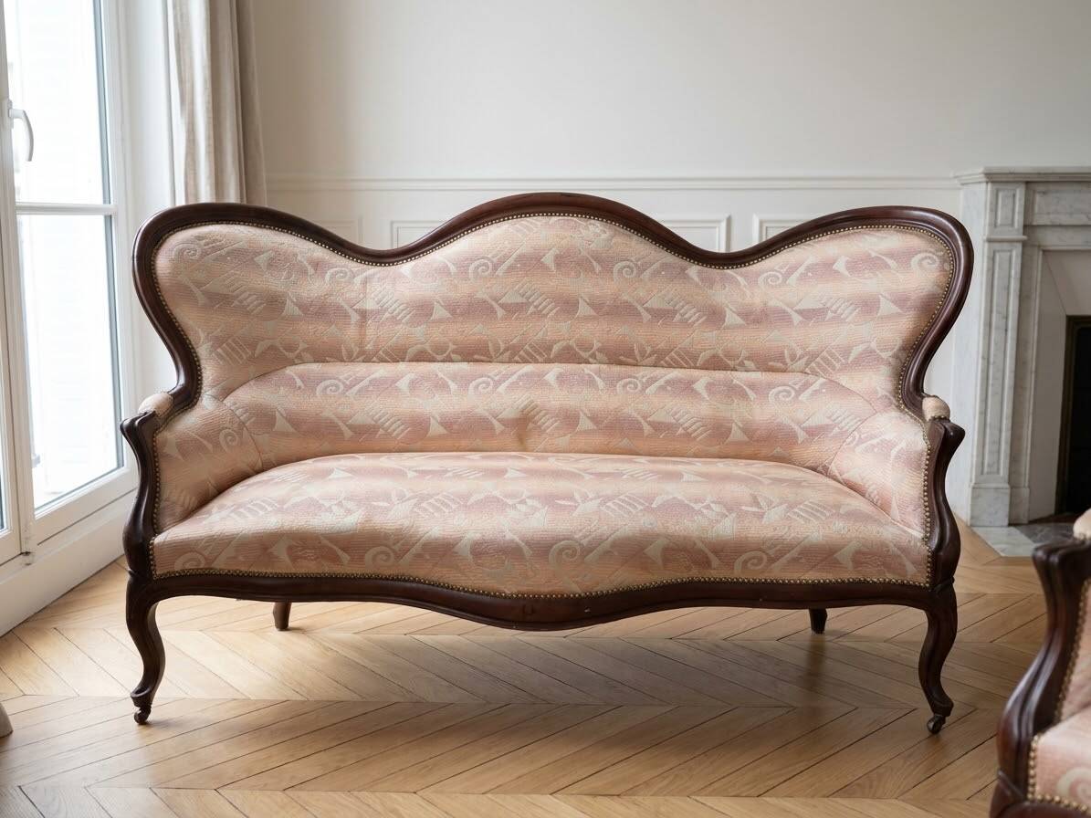 Living room set: Louis XV sofa and armchair in wood and pink fabric.