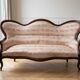 Living room set: Louis XV sofa and armchair in wood and pink fabric.