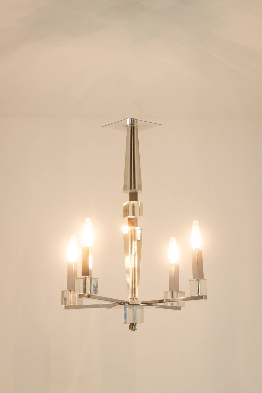 Jacques Adnet. Modernist chandelier in chromed metal. Circa 1940.