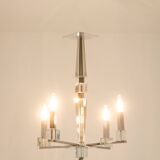 Jacques Adnet. Modernist chandelier in chromed metal. Circa 1940.