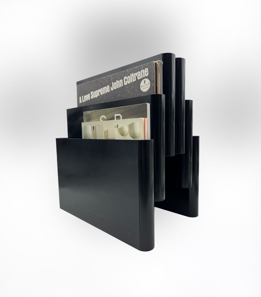 Magazine holder by Giotto Stoppino for Kartell 1970