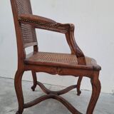 Louis XV Regency cane armchair leather armrests decorated with shell