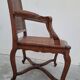 Louis XV Regency cane armchair leather armrests decorated with shell