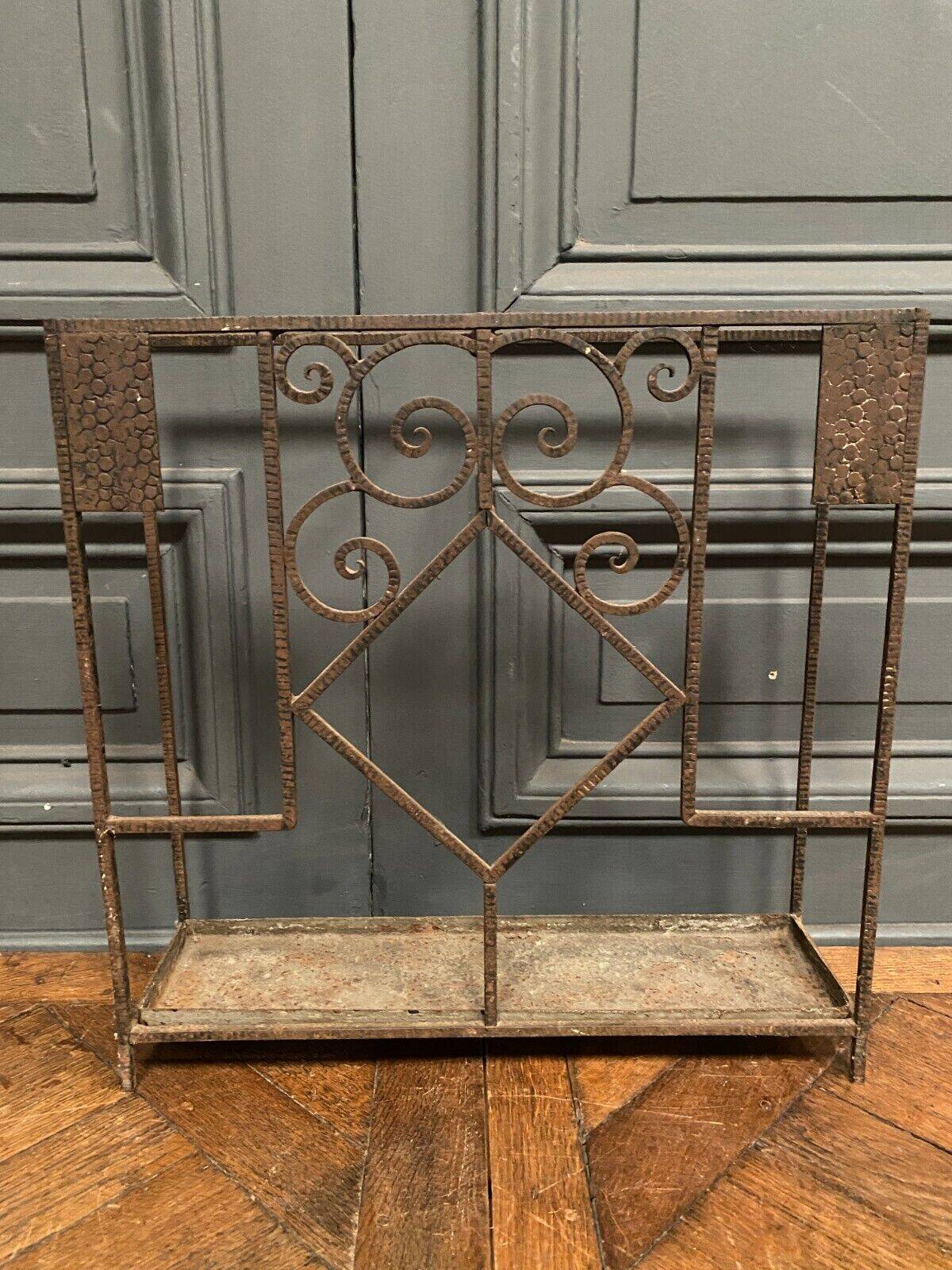 Art Deco umbrella stand in hammered ironwork 1930