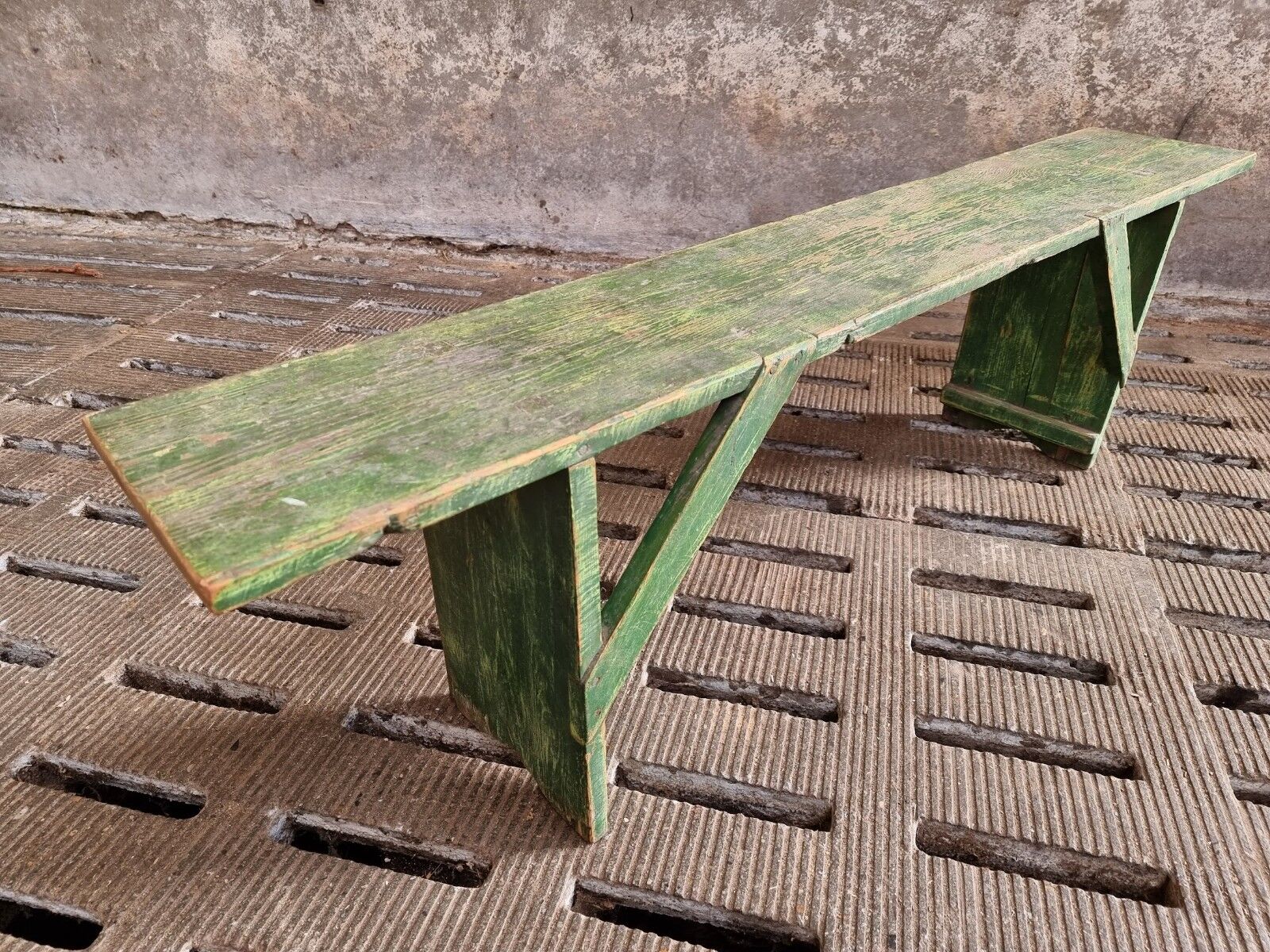 Old wooden bench side table grass green