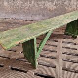 Old wooden bench side table grass green