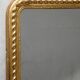 Louis-Philippe mirror with a geometric scalloped frame