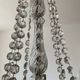 Grand chandelier in Louis XV style with crystal pendants.